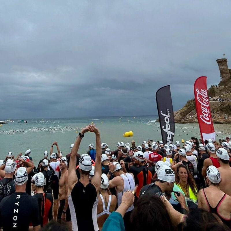 Triathlon athletes at an open water swim start